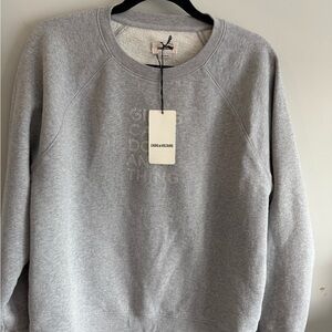 Gray woman’s Sweater